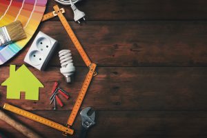 home improvement and repair concept - construction tools and objects on wooden background. top view copy space